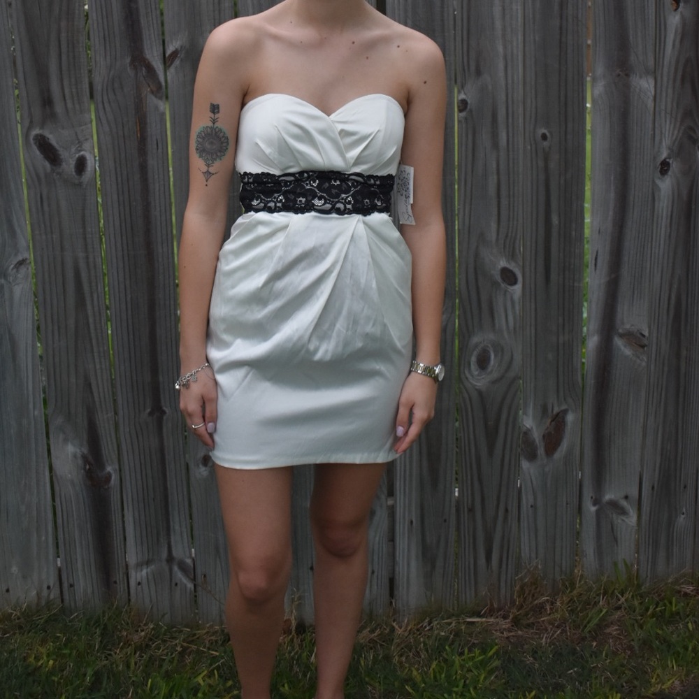 Elegant white and black lace dress